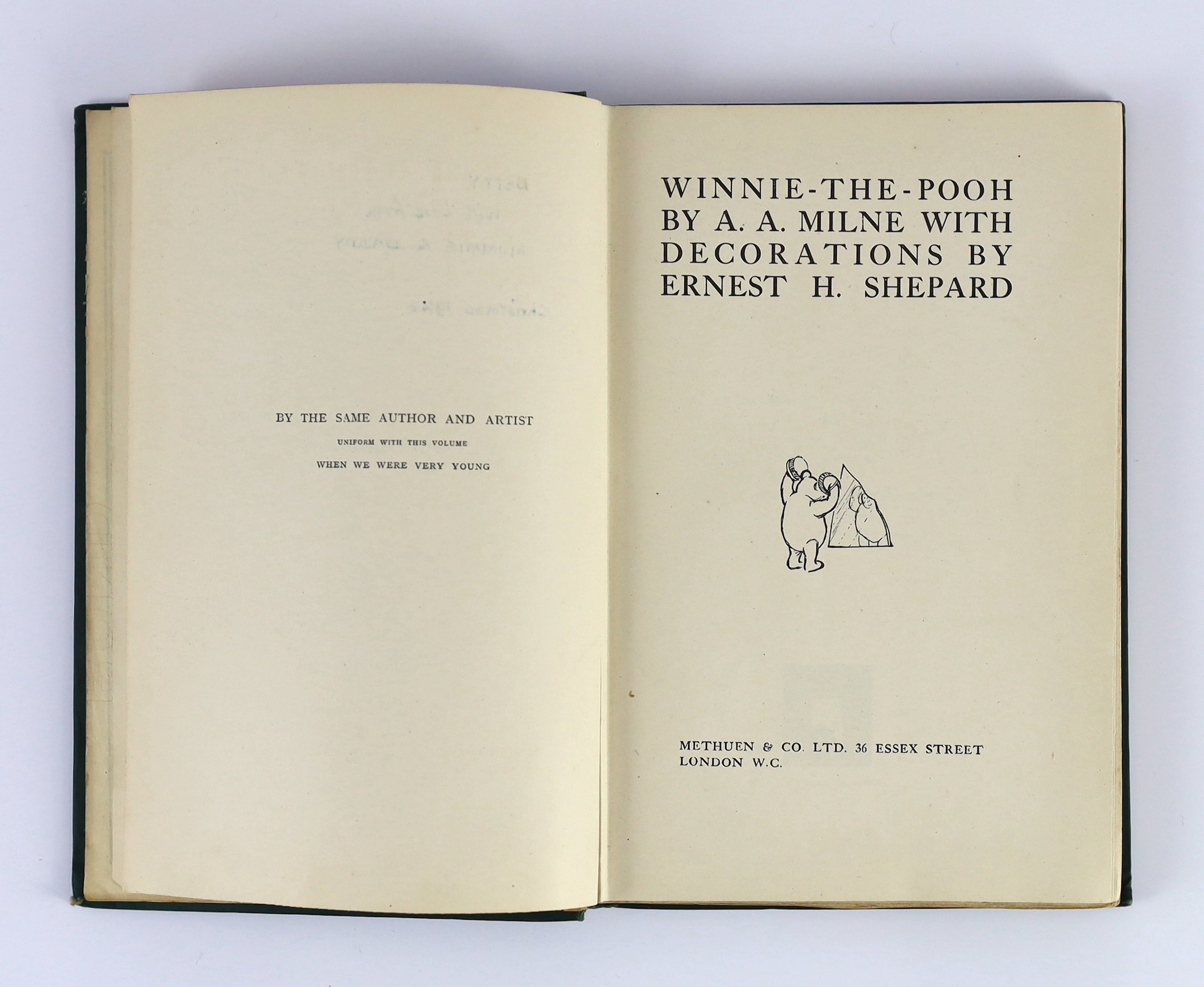 Milne, A.A. - Winnie-The-Pooh. First edition. illus. throughout (by Ernest H. Shepard, some full-page), half title; publisher's green gilt pictorial cloth, gilt top, pictorial e/ps., sm.cr.8vo. 1916